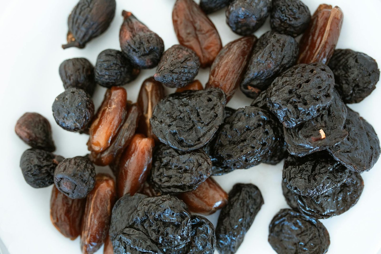 brown and black round fruits